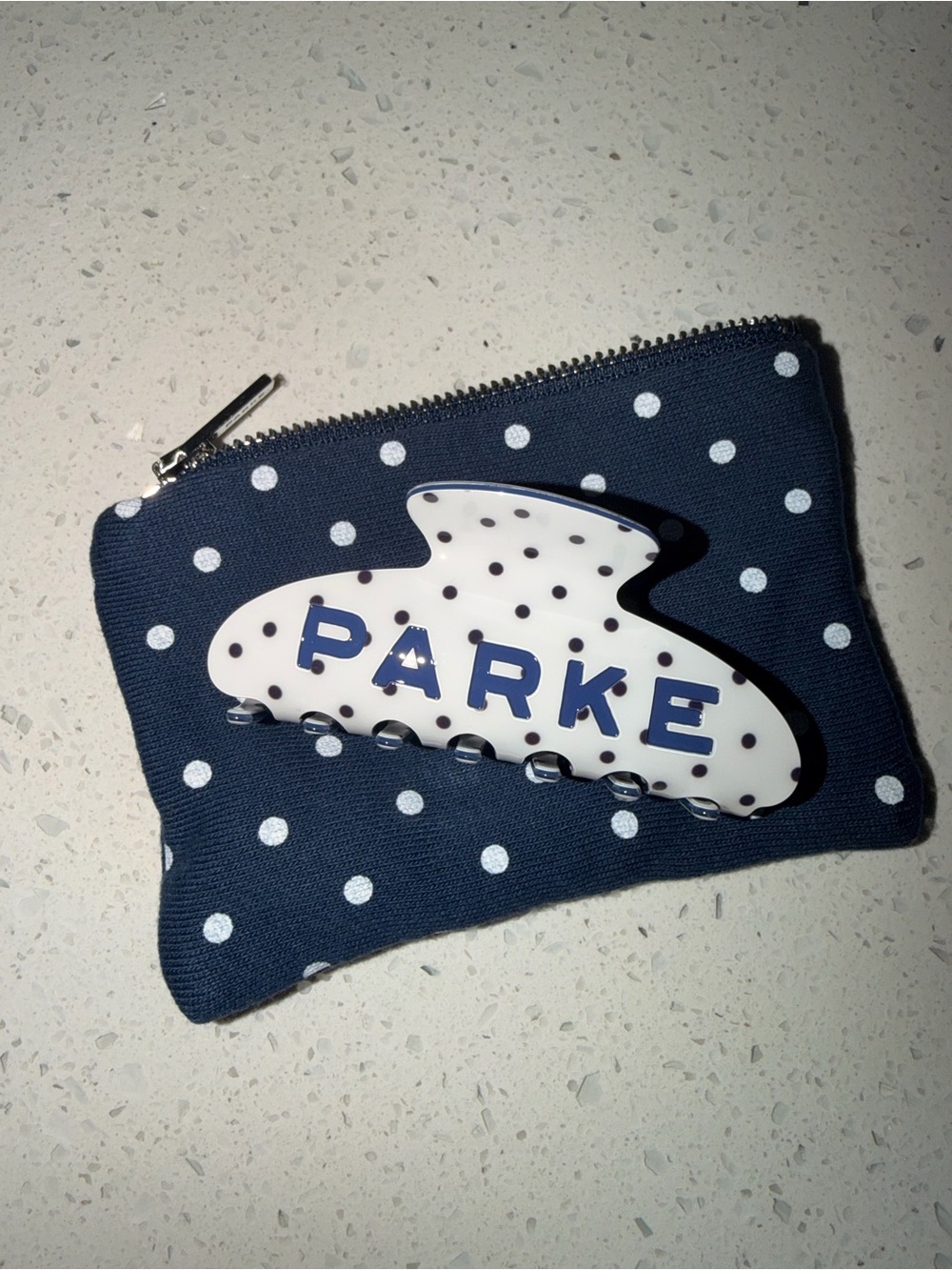 Parke White and Navy Polka Dot Clip